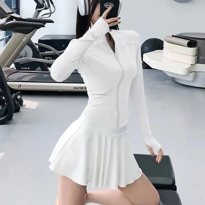 Smoes Wellness women's slim-fit long-sleeve training top for gym and running