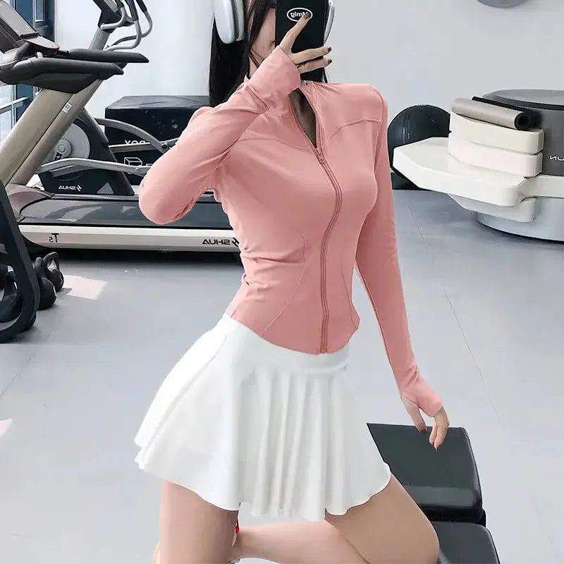 Smoes Wellness women's slim-fit long-sleeve training top for gym and running