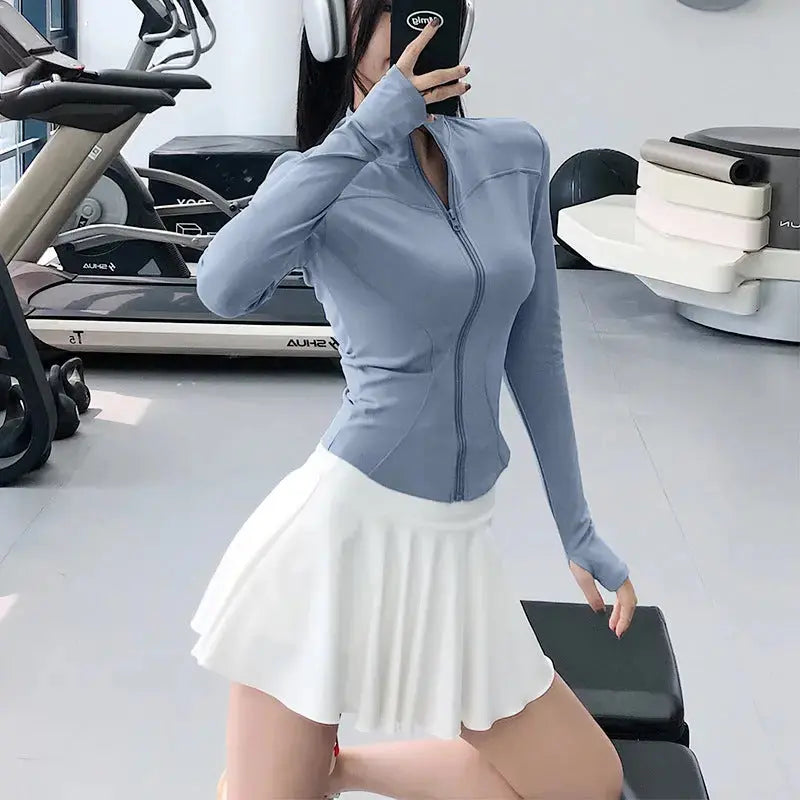 Smoes Wellness women's slim-fit long-sleeve training top for gym and running
