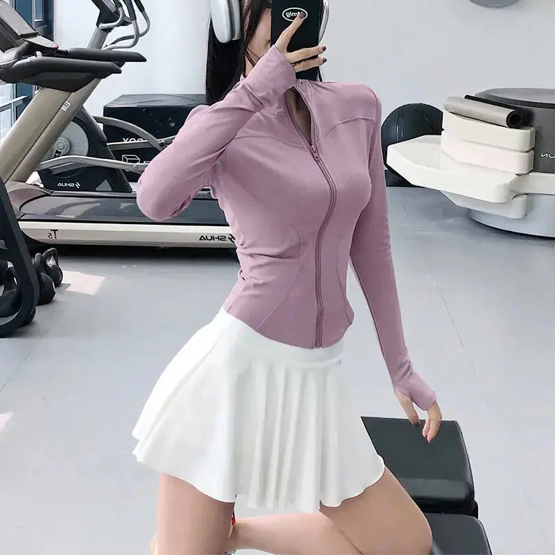 Smoes Wellness women's slim-fit long-sleeve training top for gym and running