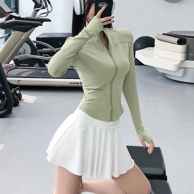 Smoes Wellness women's slim-fit long-sleeve training top for gym and running